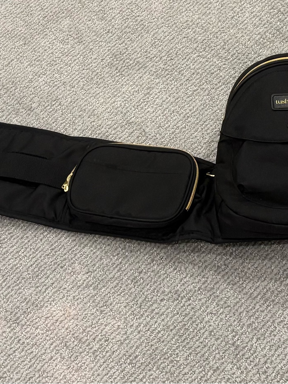 Like New TushBaby Black with Gold Accents Hands-Free Baby Carrying Bag - Picture 2 of 6